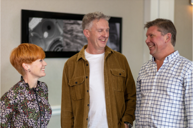 Image of three TAB members discussing creativity ideas