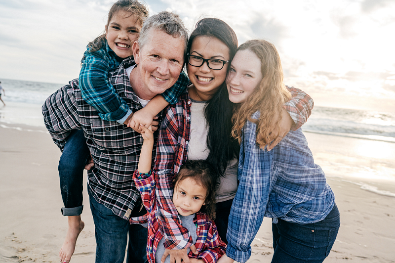 Family together on beach